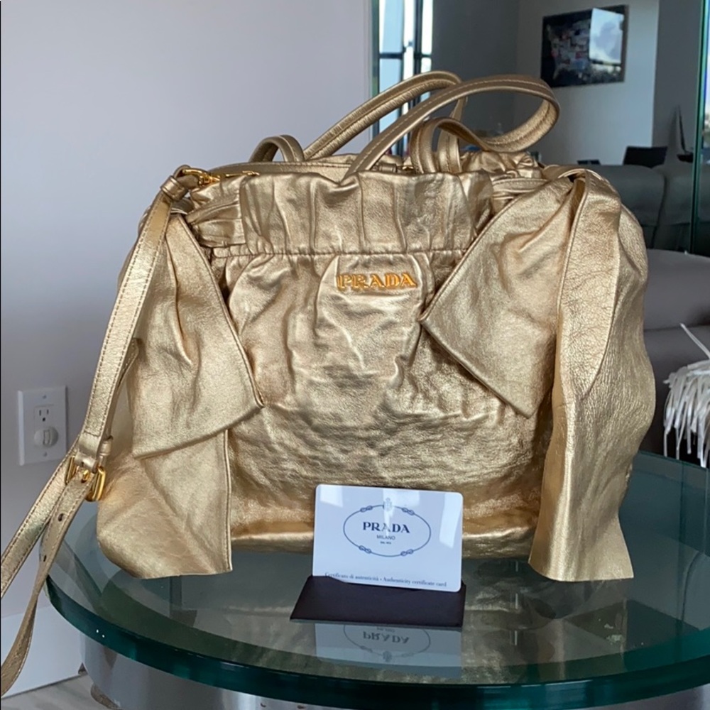 Prada gold satchel and crossbody